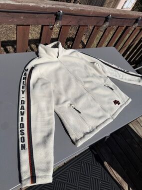 Y2K Harley-Davidson Cream Fleece Jacket with Black and Orange Trim zip pockets